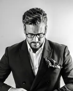Thomas Finn Managing Director of Edwards and Finn Black and White